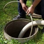 the removal of sewage sludge and cleaning of a domestic septic tank at a rural French home