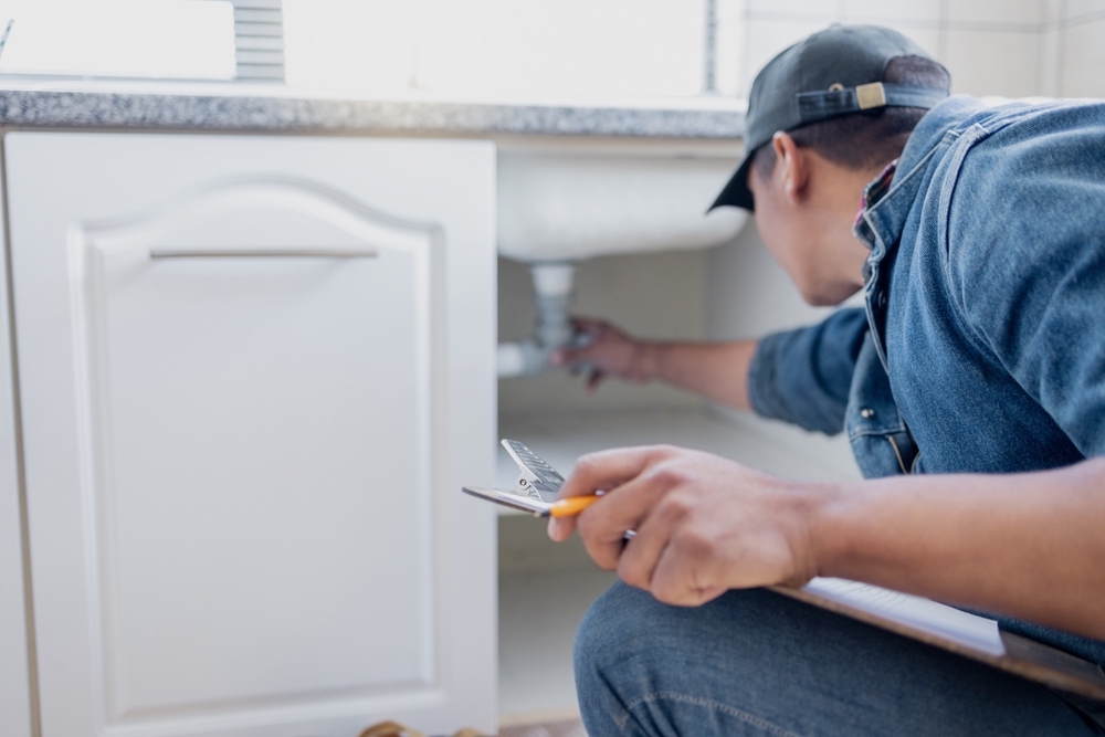 Plumber Man Technician And Clipboard Document For Pipeline Home Renovation